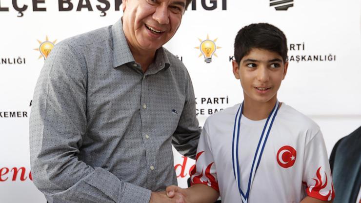 Türelden başarılı sporcuya hediye