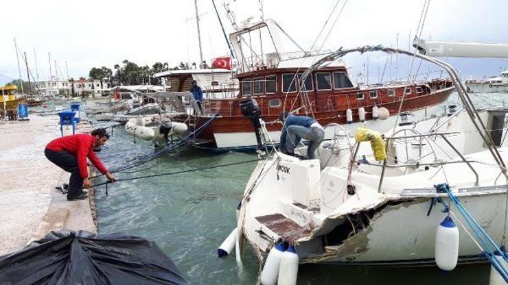 Limanda demirli tekne, fırtınada beton rıhtıma çarptı