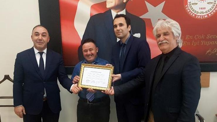 Down sendromluya gönüllerin onursal muhtarı mazbatası