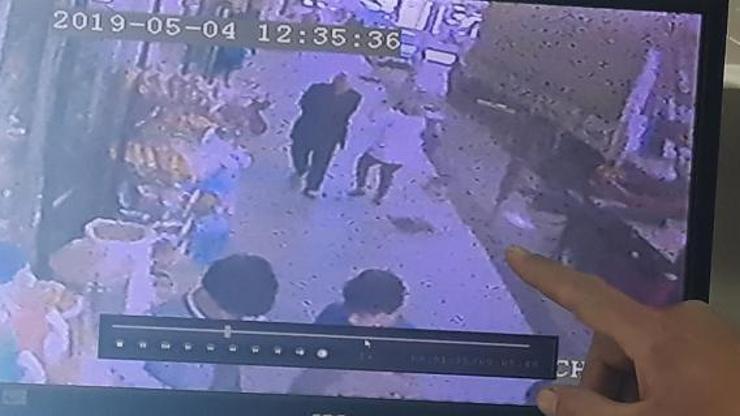 Üçüncü kattan düşen saksıdan saniyelerle kurtuldu