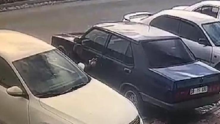Otomobilden cep telefonu hırsızlığı kamerada