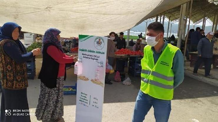 Semt pazarına giriş çıkışlarda dezenfekte uygulaması