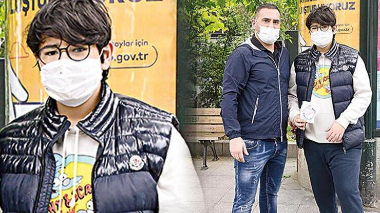 Can Karan babasının boyunda