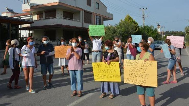 Dikilililer, parke taşı yerine asafal dökülen yola tepki gösterdi