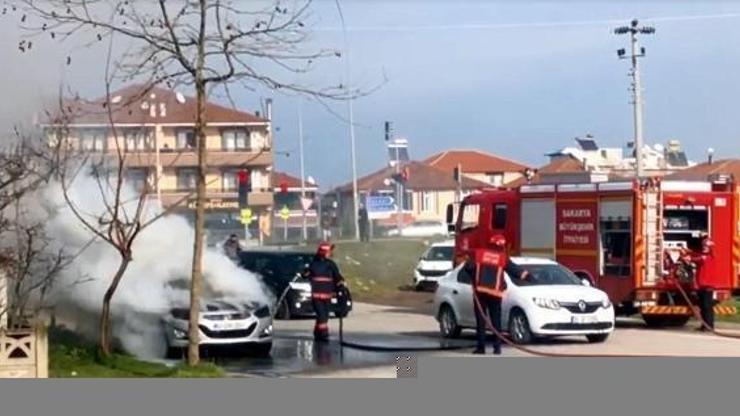İtfaiye yanan araca müdahale ederken hortumun üzerinden geçti
