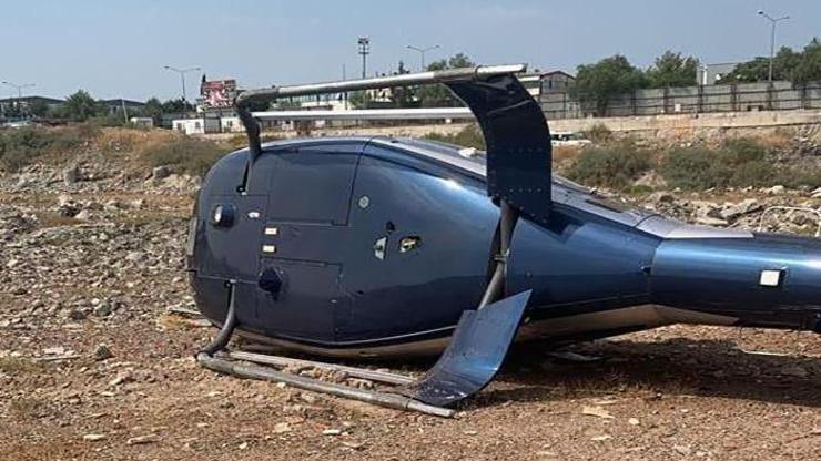 SON DAKİKA: İzmirde sivil helikopter kalkış yaptığı sırada yan yattı