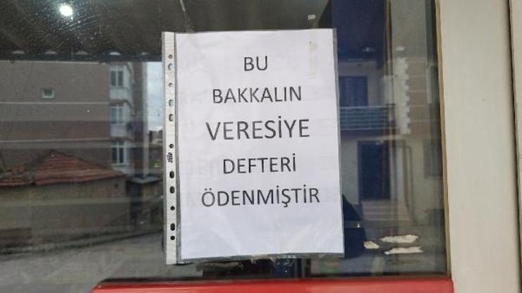 Bakkalın veresiye defterindeki 7 bin TL’lik borcu ödedi