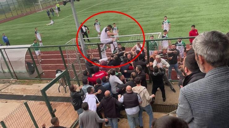 Çivili kramponla taraftara tekme attı