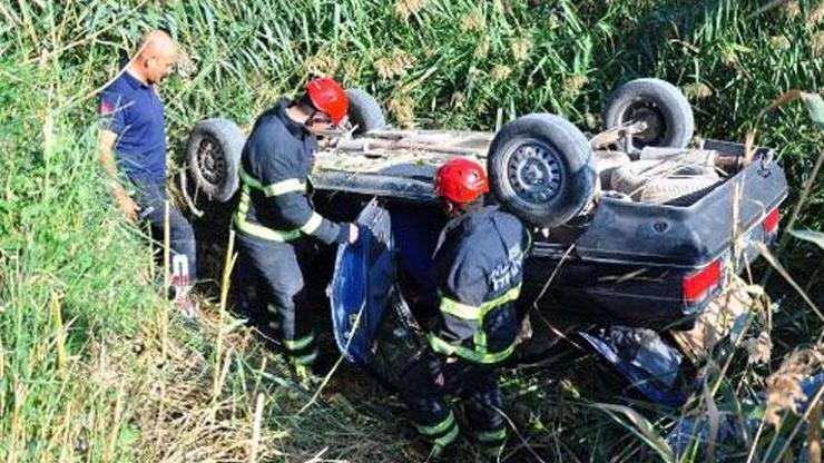Sulama kanalına uçan otomobildeki baba- kızı itfaiye kurtardı