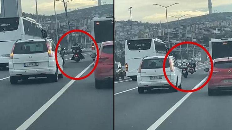 Yürek ısıtan görüntü: Fırtınada köprüyü geçmeye çalışan motosikletlilere kalkan oldular