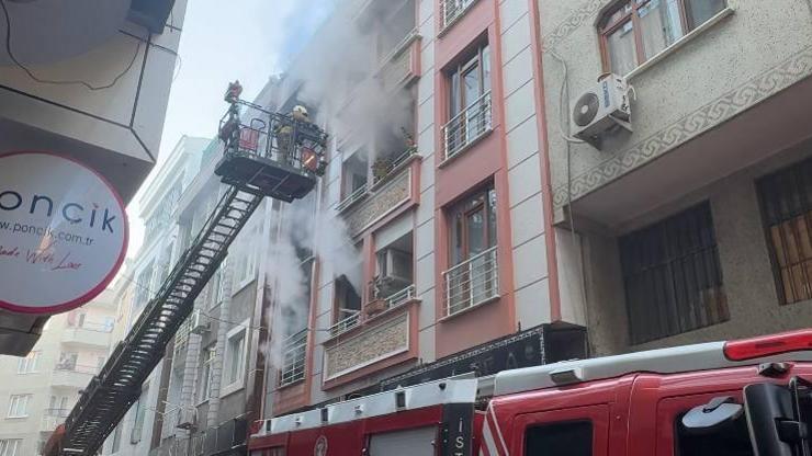 İstanbul - Zeytinburnu’nda 1inci kattaki yangında bir çocuk komşuların açtığı çarşafa atlayarak yaralandı