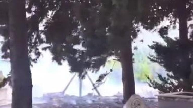 Bahçede çıkan yangın mezarlığa sıçradı