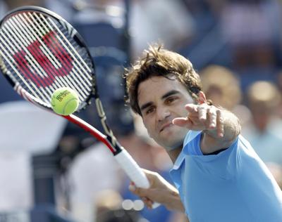 Federer ilerliyor, Davydenko elendi