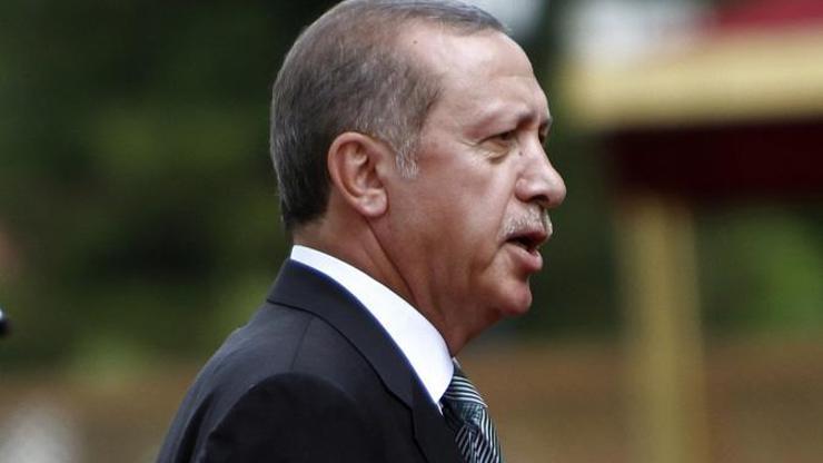 Erdoğanın makam aracına tükürene hakaret cezası