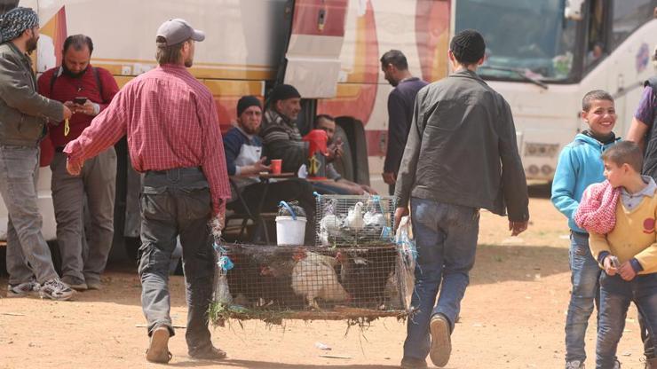 Humustan 2. tahliye: Muhalifler otobüslerle ayrıldı