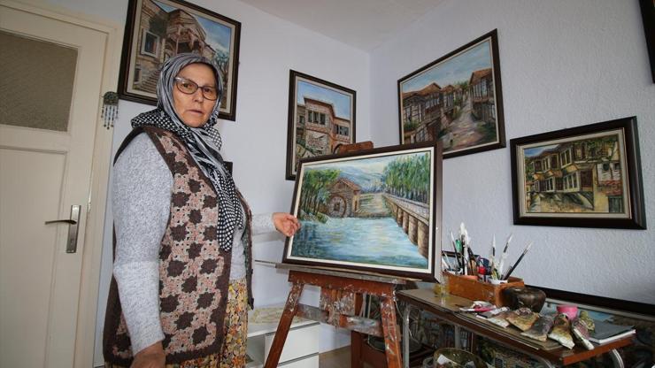 63 yaşındaki ev hanımı 16ncı resim sergisini açıyor