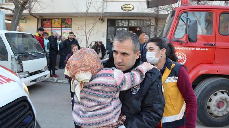 Yangında mahsur kalan kadını böyle kurtardı