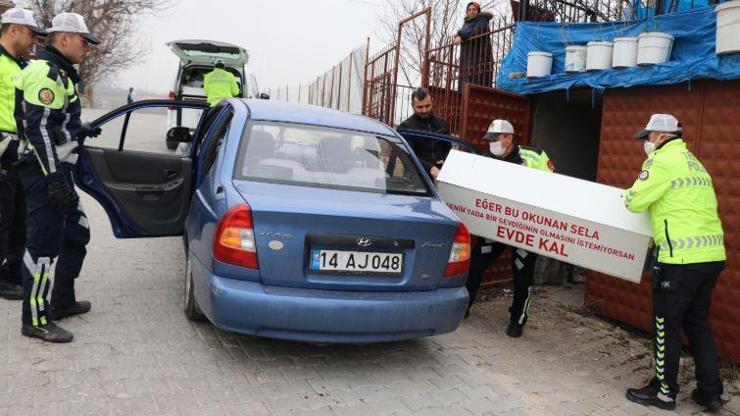 Aracına bağladığı tabutla ‘evde kal’ çağrısı yapan sürücüye ceza