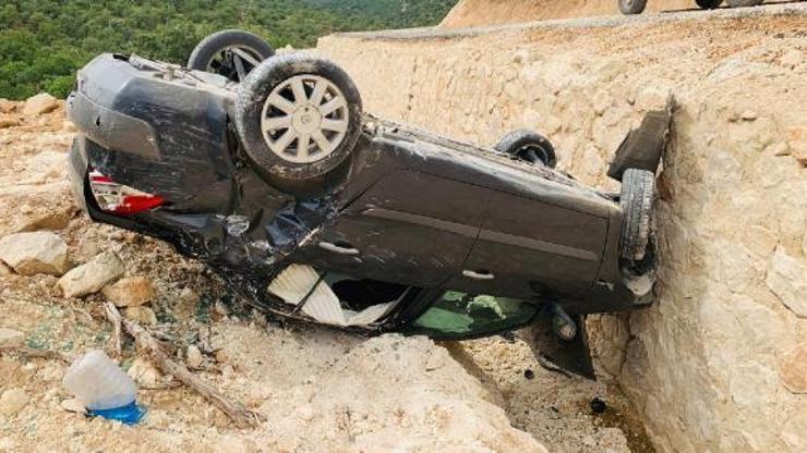 Takla atan otomobilin sürücüsü yara almadan kurtuldu