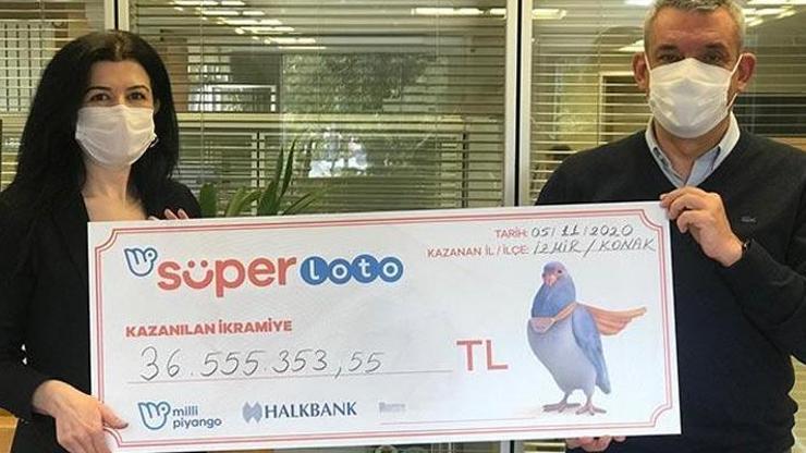 Süper Loto’dan büyük ikramiye kazanan talihli çekini teslim aldı