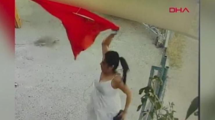 Bayrağı koparıp çöpe atan kadın yakalandı