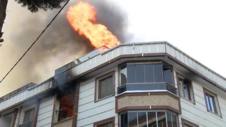 Alev alev yanan binadaki 5 kişi dumandan etkilendi