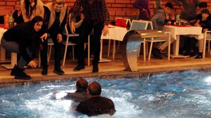 Mustafa Keser, depremzedelere moral gecesinde havuza düştü
