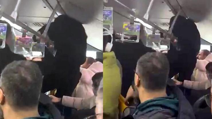 Metrobüste boş koltuk kavgası: Tutunma demirine tırmanıp yumruk attı