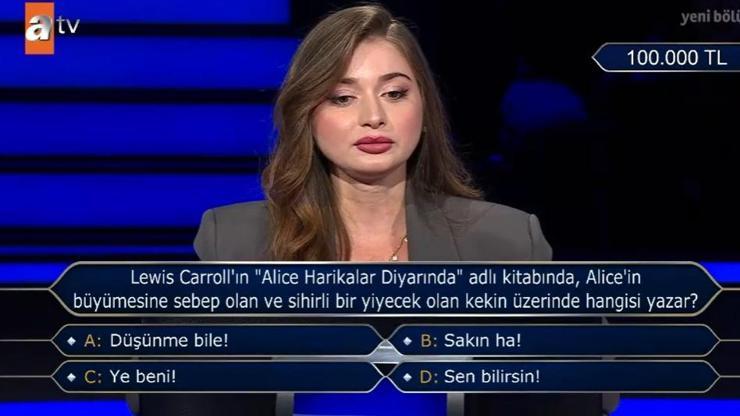 Alice Harikalar Diyarı kitabı Alicein büyümesine sebep olan ve sihirli bir yiyecek olan kekin üzerinde hangisi yazar