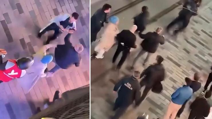 O anlar kamerada: Taksimde tekme tokat kavga