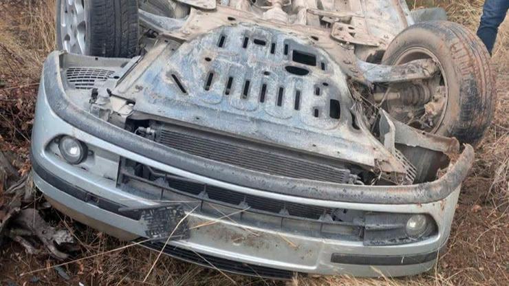 Takla atan otomobilden yara almadan kurtuldu