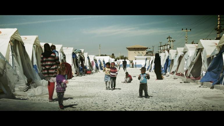 Teomandan mülteciler için klip: Limanında