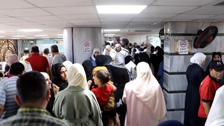 Son gün paniği Suriyede bankaların önünde insan seli